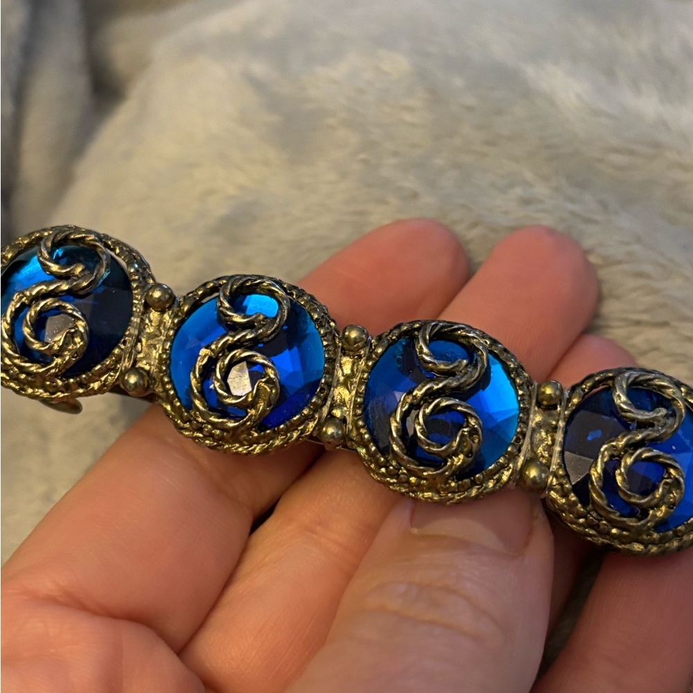 Blue and Gold Hair Accessory with Ornate Filigree Design
